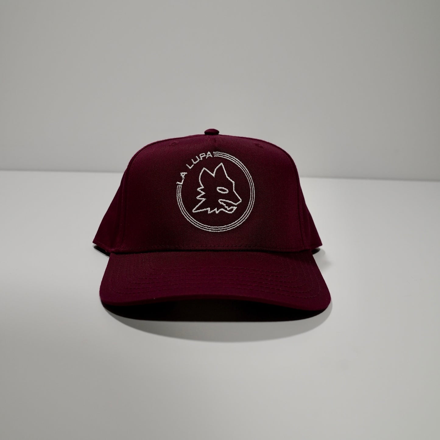 Maroon Hat Logo